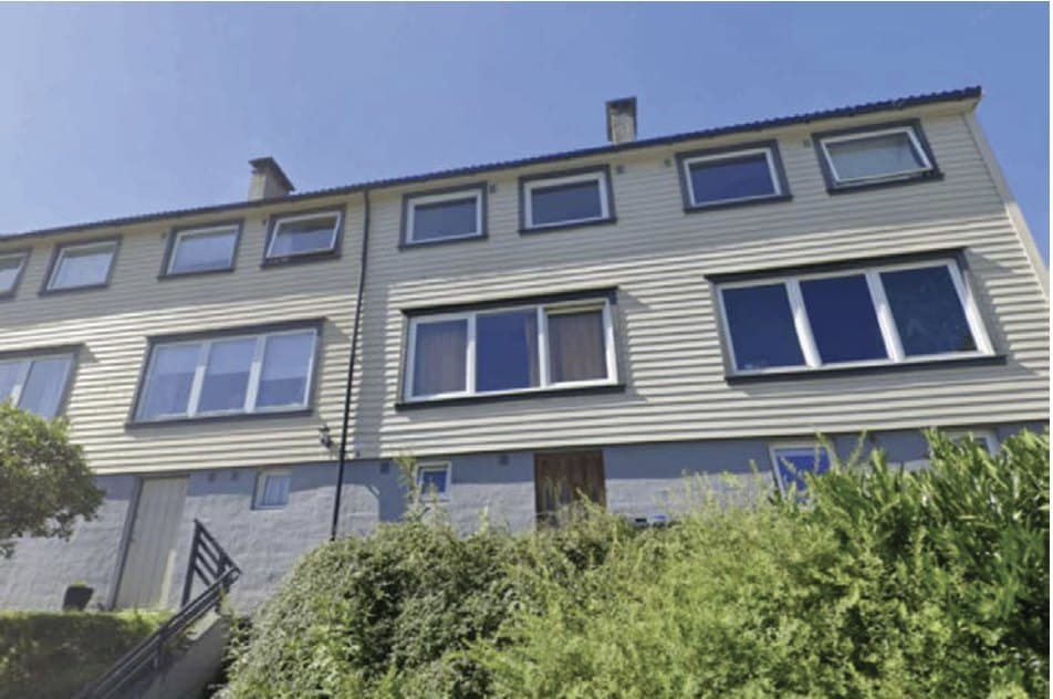 Fasaden før oppussing